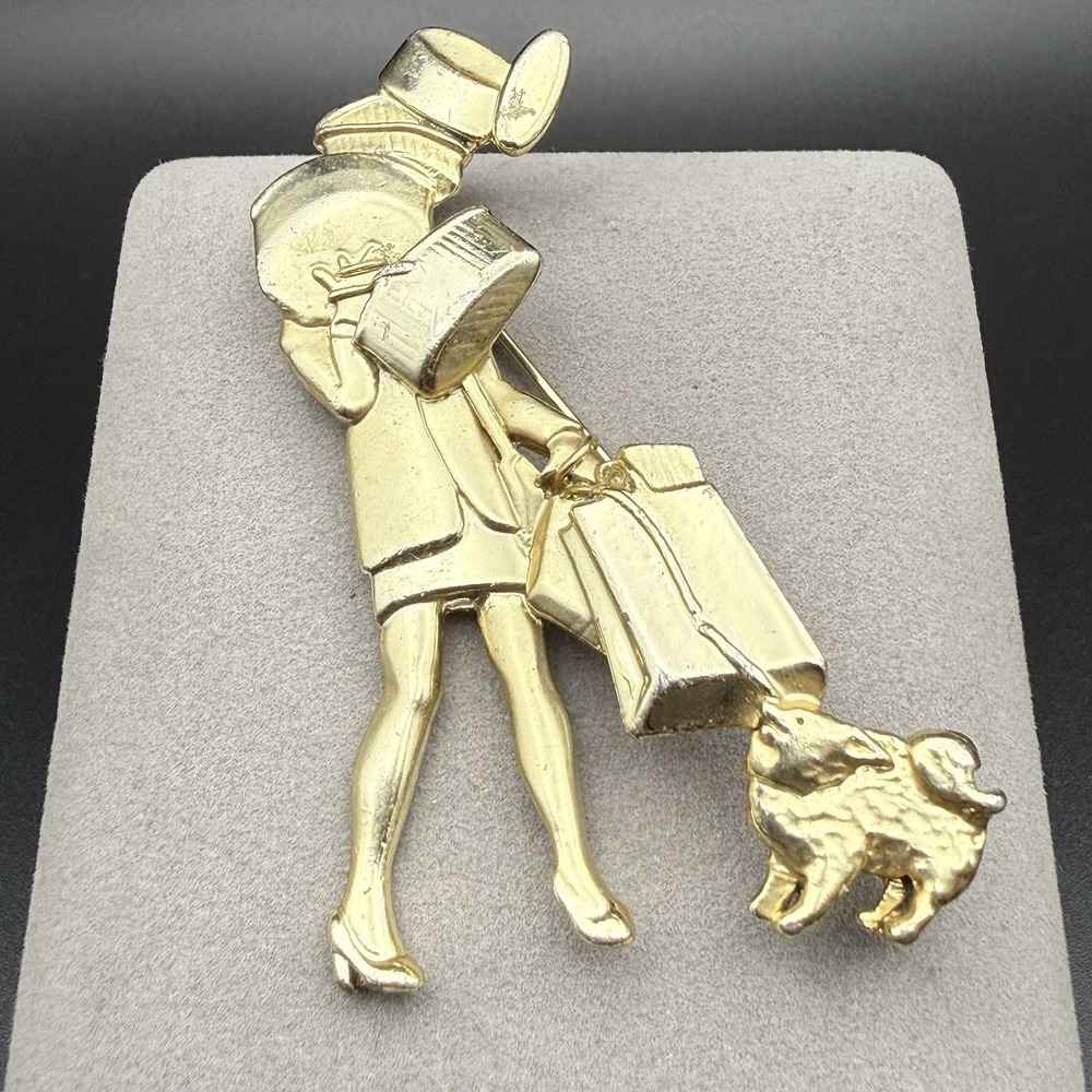 Vintage AJC Shopaholic Woman & Dog Brooch Shopping Bag Hat Box Gold Tone Pin